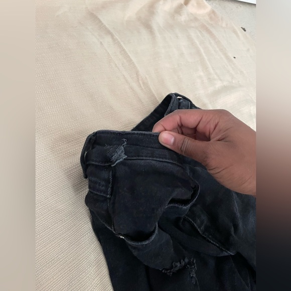 Size 3 black flare out jeans from Almost Famous! Has some Damages. - Picture 2 of 5
